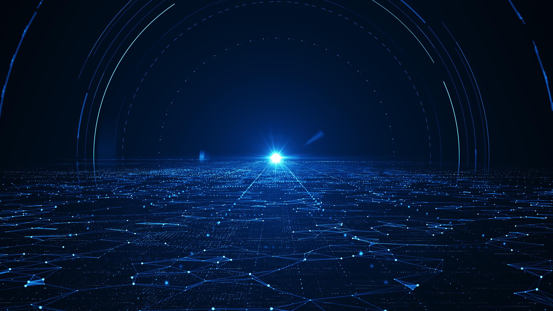 High angle shot, power grid with wireframe overlay connecting data points in lower half of image and bright light rising over horizon against dark blue background